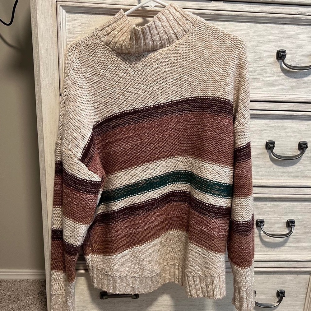 Cozy & colorful Free People sweater. Size XS but fits oversized.